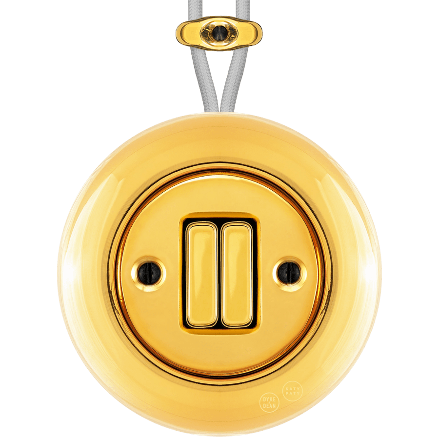 PORCELAIN KATY PATY COLONA ROUND SURFACE MOUNTED DOUBLE SLIM BUTTON SWITCH GOLD - DYKE & DEAN