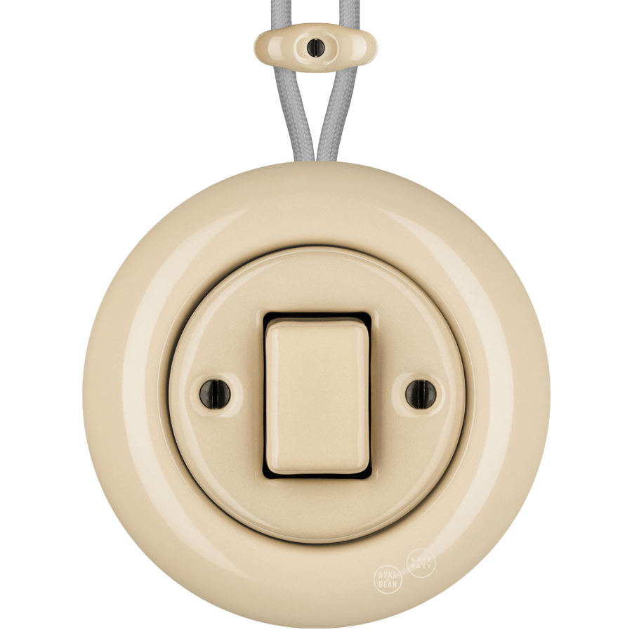 PORCELAIN KATY PATY COLONA ROUND SURFACE MOUNTED FAT BUTTON SWITCH SAND - DYKE & DEAN