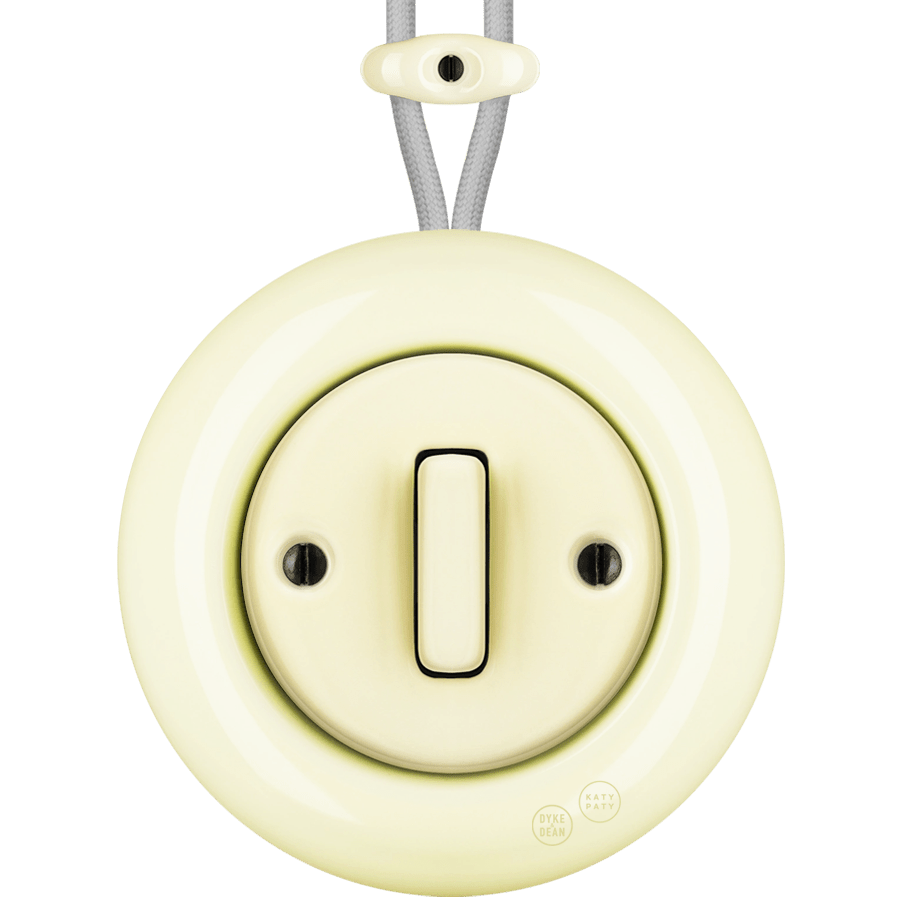 PORCELAIN KATY PATY COLONA ROUND SURFACE MOUNTED SLIM BUTTON SWITCH VANILLA - DYKE & DEAN