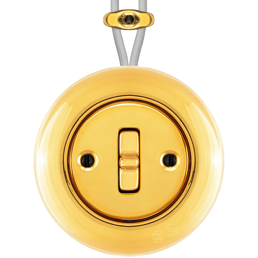 PORCELAIN KATY PATY COLONA ROUND SURFACE MOUNTED TOGGLE BUTTON SWITCH GOLD - DYKE & DEAN