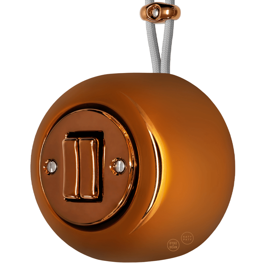 PORCELAIN ROUND SURFACE MOUNTED DOUBLE SLIM BUTTON SWITCH BRONZE - DYKE & DEAN