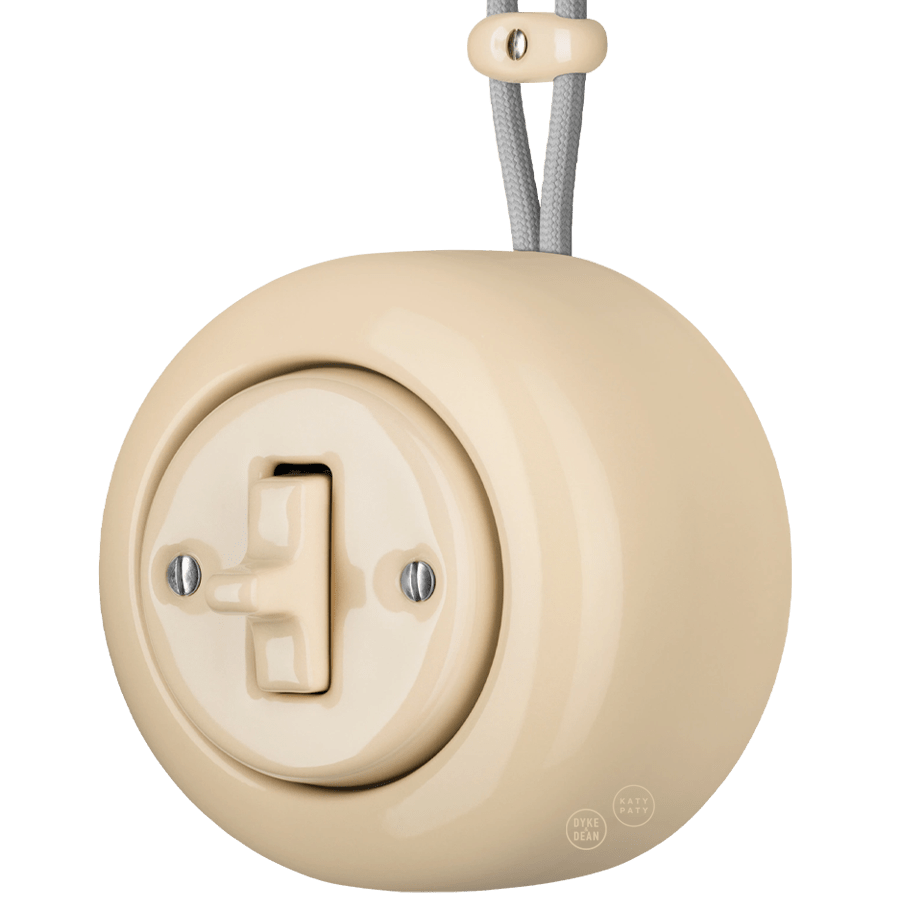 PORCELAIN ROUND SURFACE MOUNTED TOGGLE BUTTON SWITCH SAND - DYKE & DEAN